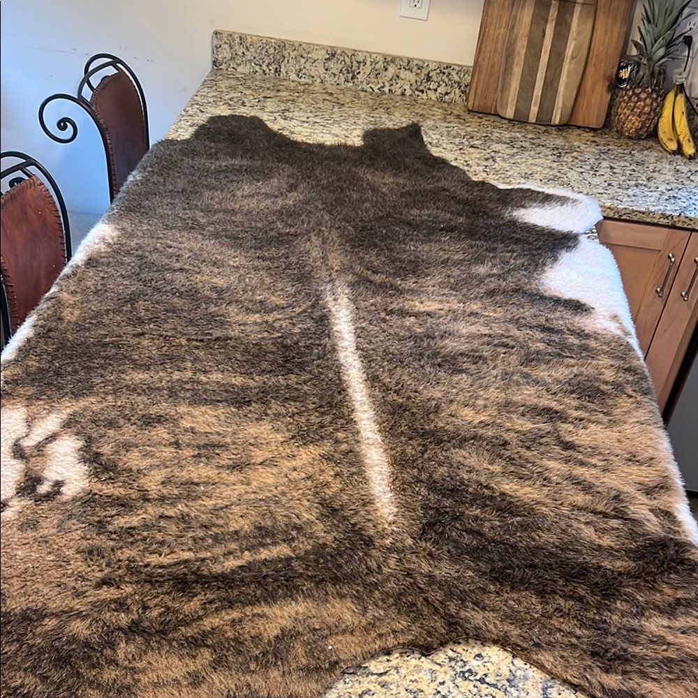 Brown and White Cow Animal Hide Rug